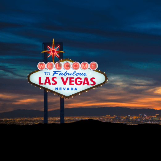 Photo of Las Vegas Strip with Welcome to Las Vegas sign in the forefront.