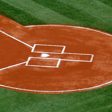 Photo of a baseball field focused on home plate.
