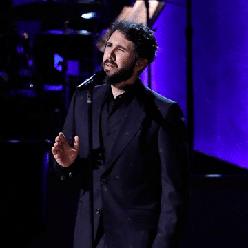 Josh Groban singing on stage