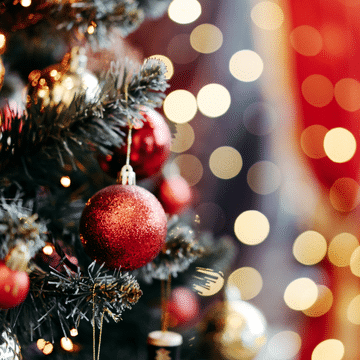 Photo of Christmas tree with ornaments and twinkling lights.