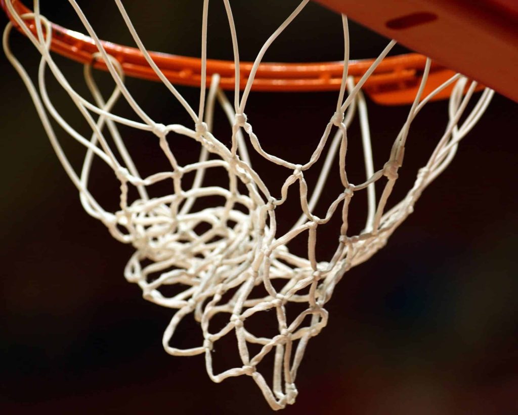Photo of a basketball net and hoop.