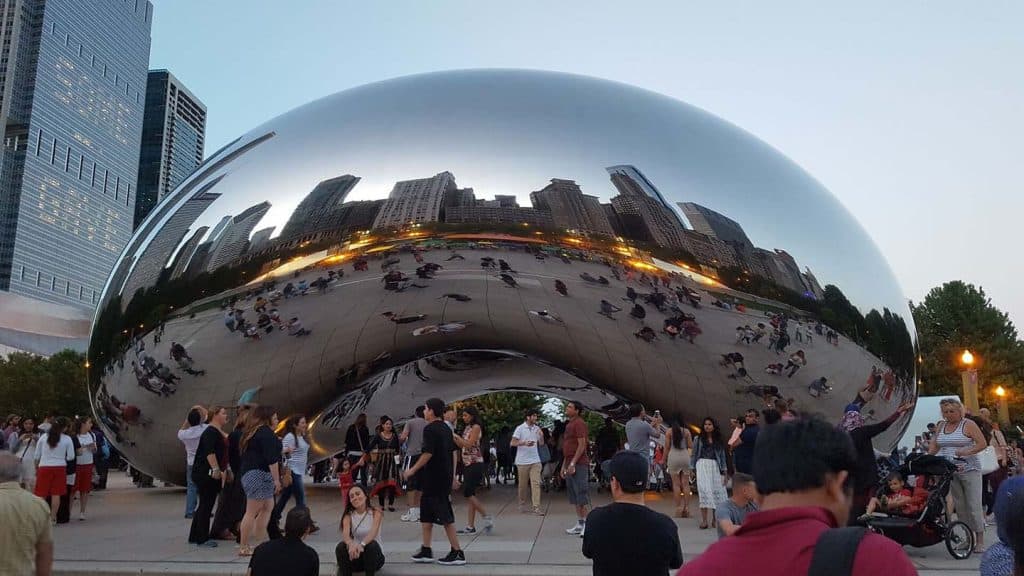 The Cloud Gate Sculpture, or The Bean as it known, reflects the bystanders around it.