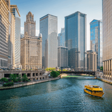 Commercial buildings and a river in Chicago.