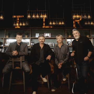 Lonestar, a group of four men sitting at a bar.