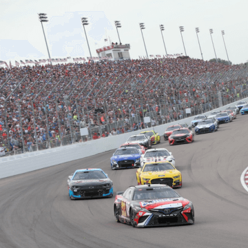 Photo from the track of NASCAR cars racing in the Enjoy Illinois 300 presented by TicketSmarter.