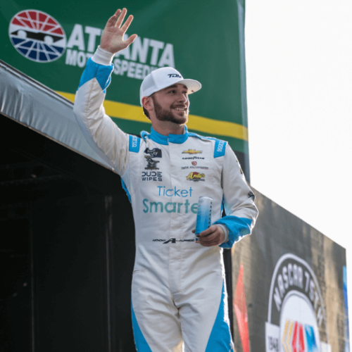 Photo of Anthony Alfredo waving at the crowd after a race at Atlanta Motor Speedway.