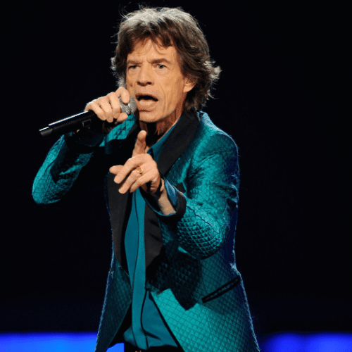 Photo of The Rolling Stones' Mick Jagger singing on stage.