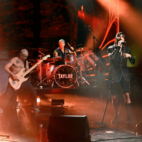 Photo of the Red Hot Chili Peppers performing on stage.