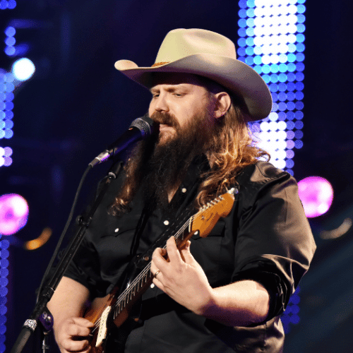 Photo of Chris Stapleton performing on stage.