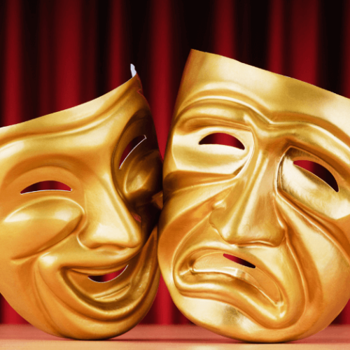 Image of two golden theatre masks