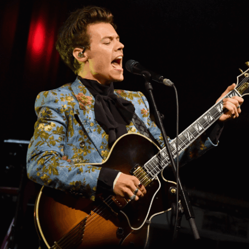 Image of Harry Styles performing